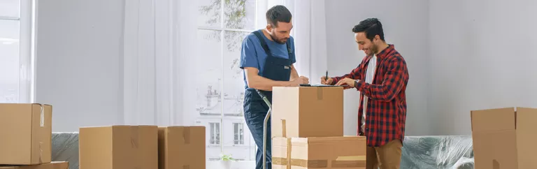 Two men going over moving labor plan