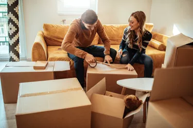 Couple packing for storage.
