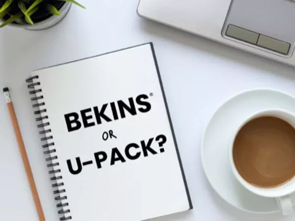 Image showing notepad saying "Bekins or U-Pack?" next to a computer and cup of coffee.